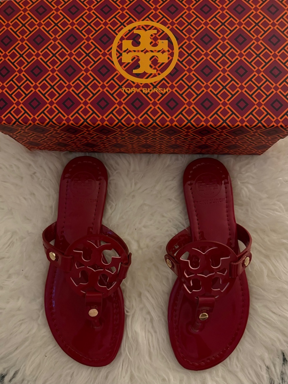 Red glossy Tory Burch